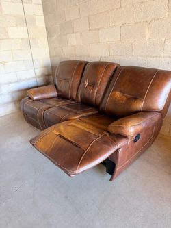 Brown leather manual reclining sofa