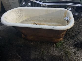 Old bath tub. Make good flower pot