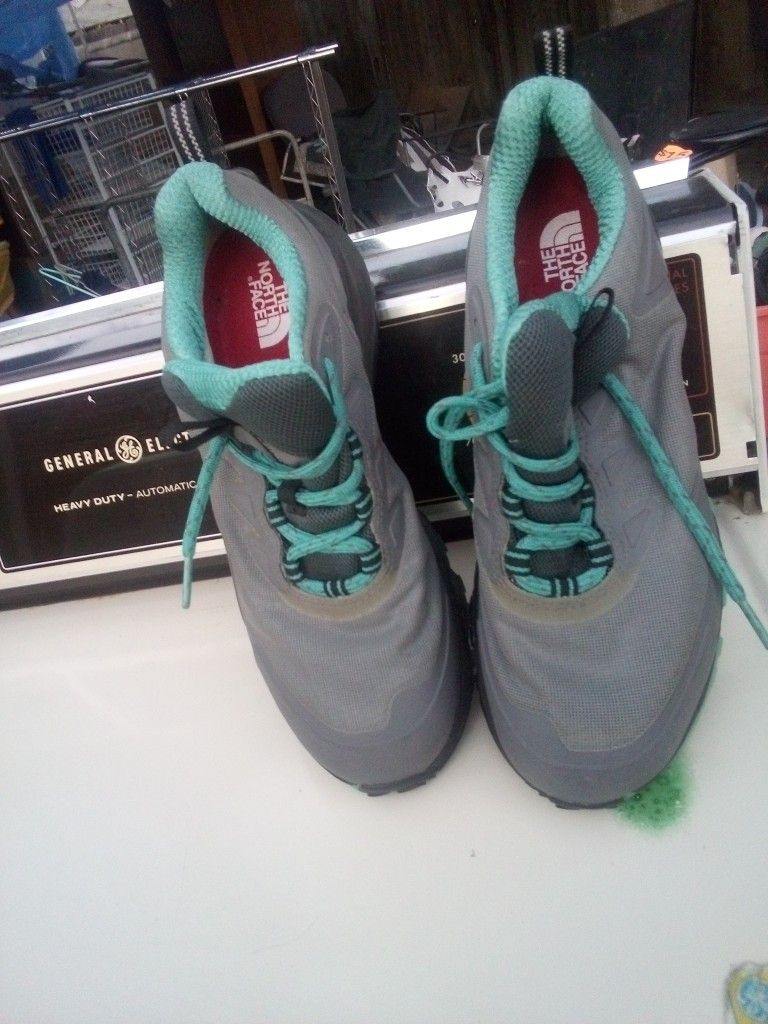 A Pair Of Women's Sneakers