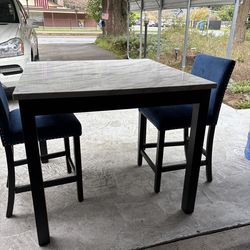 Bar height table and 2 chairs