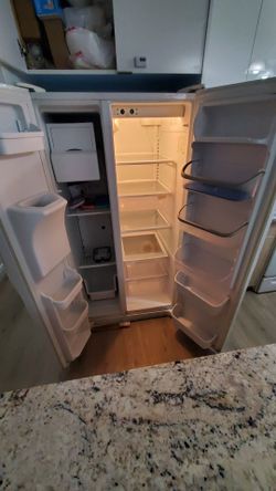 Large side by side fridge with ice maker and water dispenser