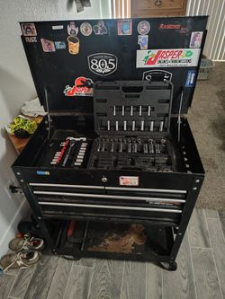 Tool box with some tools and C clamp