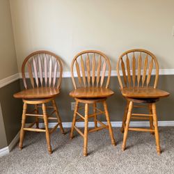 3 Swiveling Wood Barstools
