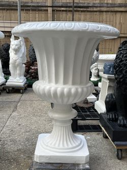 CONCRETE URN PLANTERS $200EACH