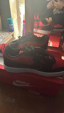 Black and red Nikes