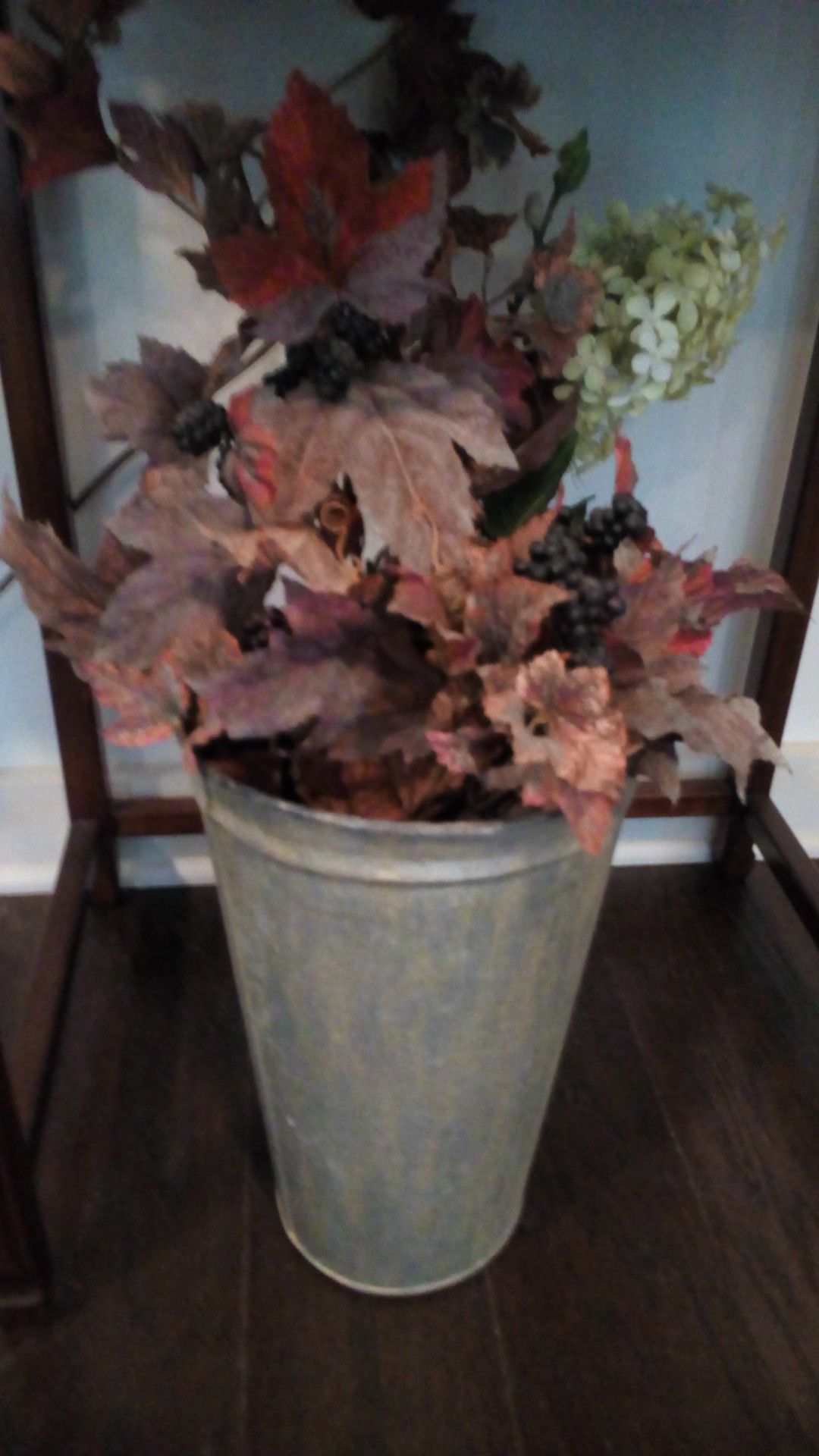 Dried arrangement in silver bucket