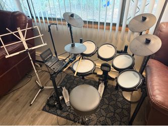 Simmons electronic drum set with fender amplifier