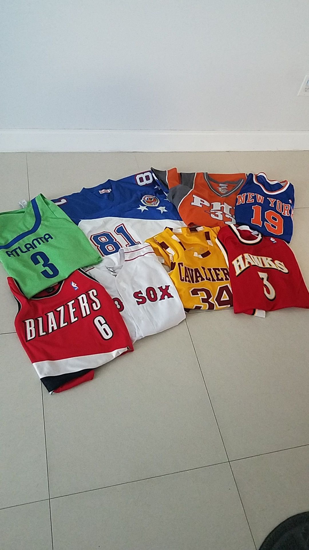 8 Authetic Jerseys (Size 56)