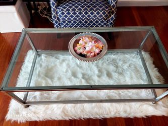 Modern glass coffee table.
Thick tempered glass top