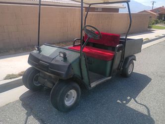 EZ Go gas powered utility golf cart