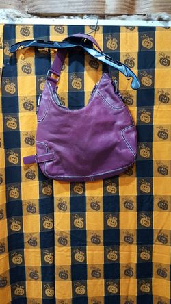 Michael Kors magenta/lavender/purplish color shoulder/hand purse.