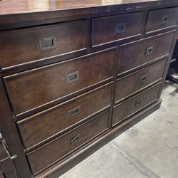 Brown Wood Nine Drawer Dresser 