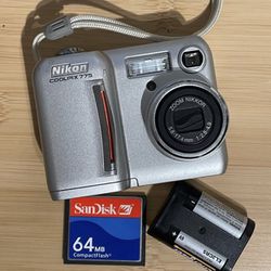 Nikon Coolpix 775 Silver Digital Camera Tested Works  Flash photo video zoom all working. Battery and compact flash memory card are included. Battery 