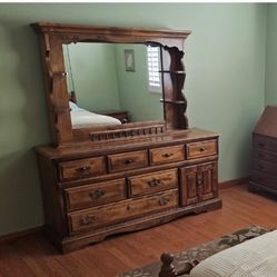 Dresser w/mirror, $350, Three Coffee tables, $200