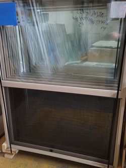 Total Of 9 Brand New Double Payne Windows. 46 X 59