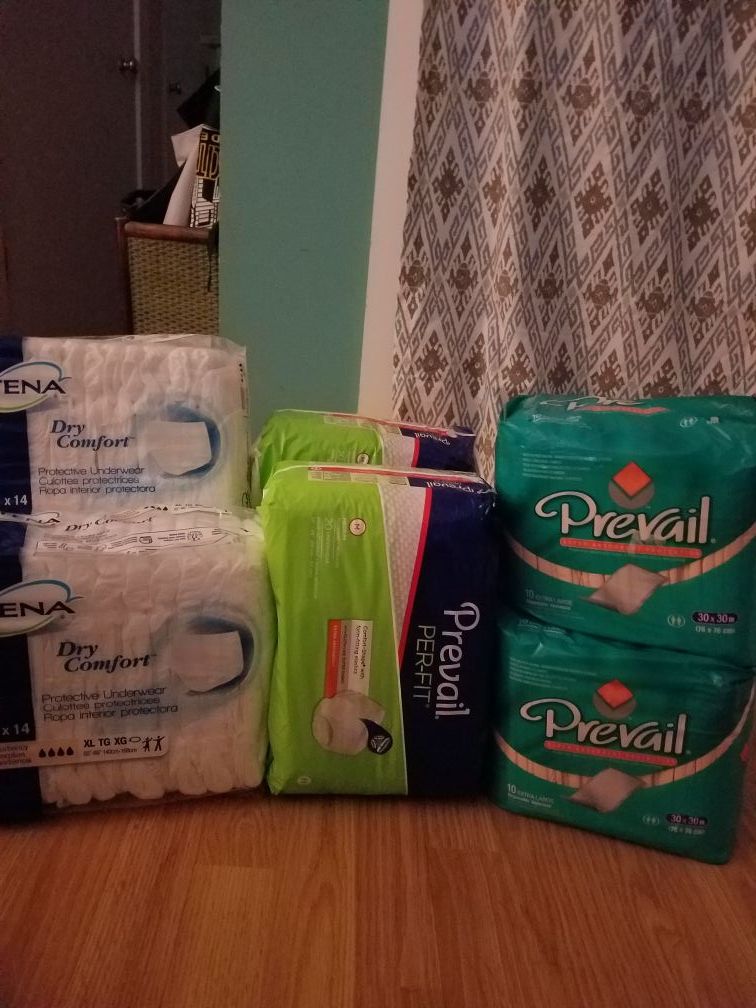 all together 5 diapers 2 pkg of prevail pads