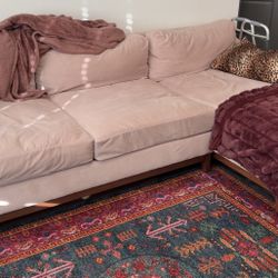 Pink living spaces couch