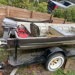 14 ft aluma craft with 15 hp engine  and a  8 hp engine title in hand 