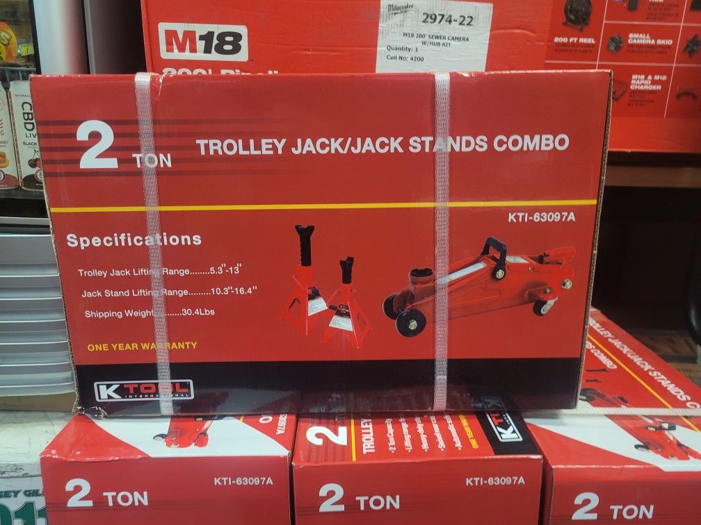 BLOW OUT FLOOR JACK AND 2 JACK STANDS