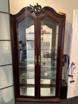 Italian curio cabinet with glass shelves