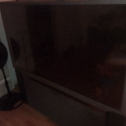 60"L  - 32"W Ultravision big screen tv