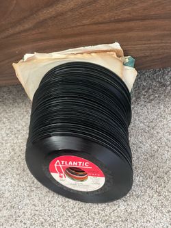 Stack of 45 7” vinyl records