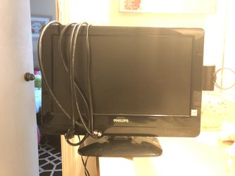 19 INCH TV WITH CABLE CORDS! Good condition.