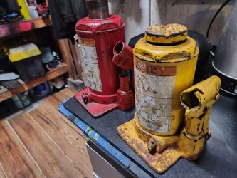 Two original ford bottle jacks