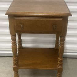 Vintage Maple Solid Wood Nightstand With One Drawer And Shelf. Used in good condition with some minor cosmetic blemishes. These blemishes are in the f