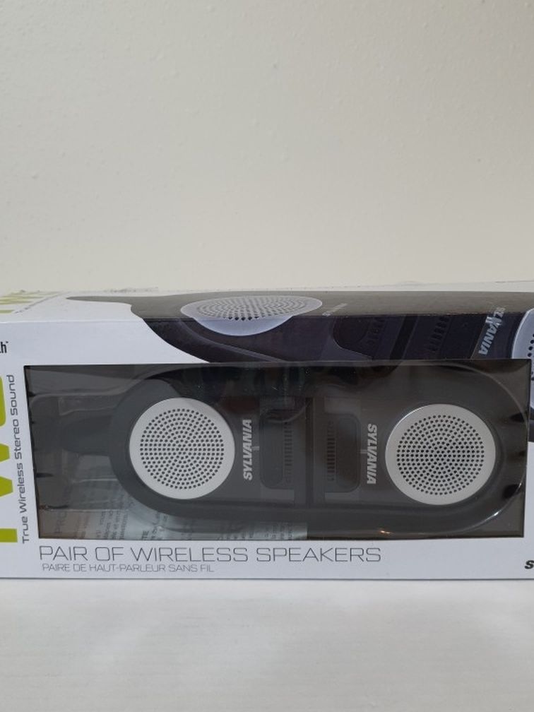 NEW Sylvania Wireless Bluetooth Magnetic Speakers Set True Stereo Silicone Case. Condition is "New". Set up a portable sound system at home or take yo
