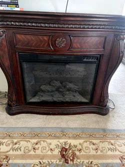 Nut brown electric fire place by Canora Grey