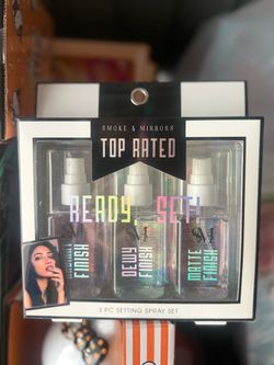 his Smoke & Mirrors setting spray set includes three different finishes: matte, dewy, and radiant (last one)