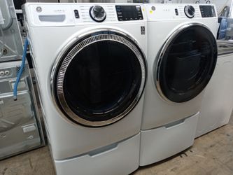GE front load washer and dryer set on pedestals - Free delivery
