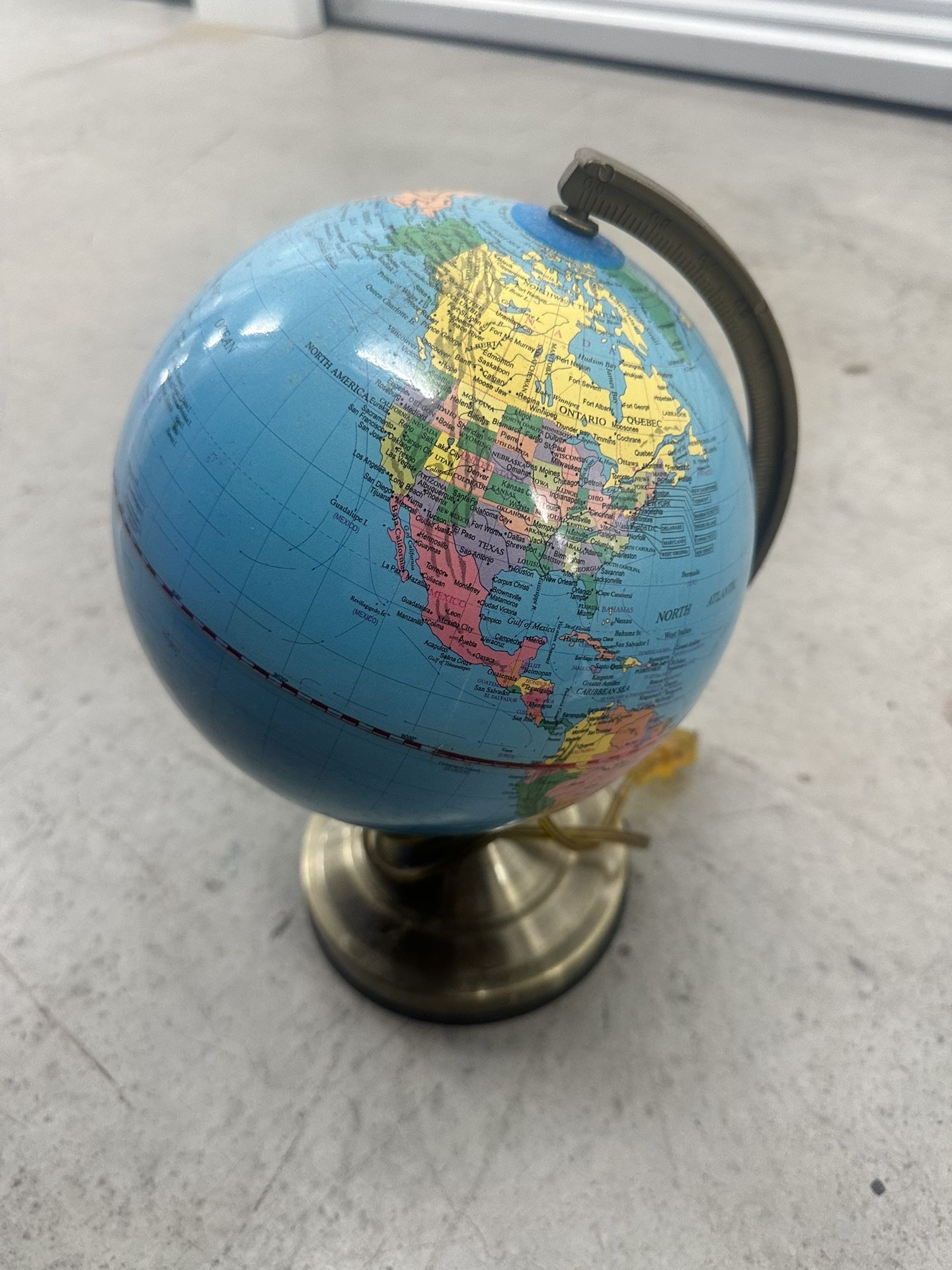 VINTAGE WORLD GLOBE ROTATING METAL STAND