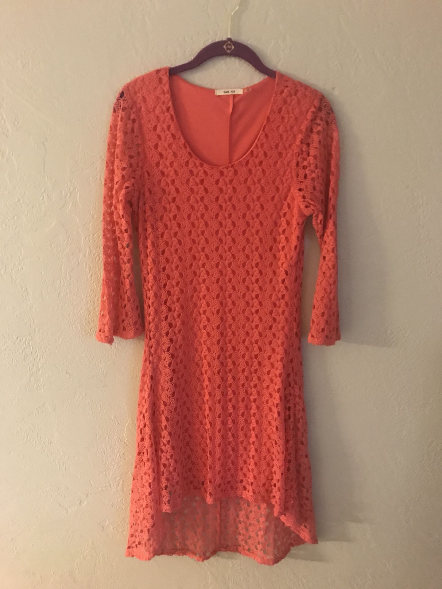 Tangerine beautiful dress. Looks great with cowboy boots too.