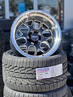 17X11 RIMS WITH 3153517 TIRES WE FINANCE 