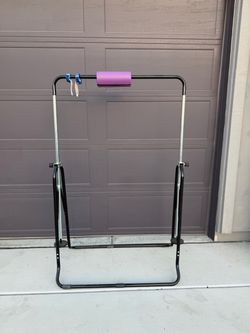 Gymnastics bar, bar pad, and hand grips