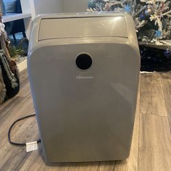 Hisense 12,000 BTU portable air conditioner unit with window kit