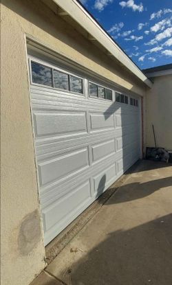 White Raised Panel Garage Door with Windows