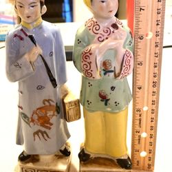 Pair of Vintage Porcelain Figurines Of An Asian Couple 8.25” tall -in good vintage condition! 