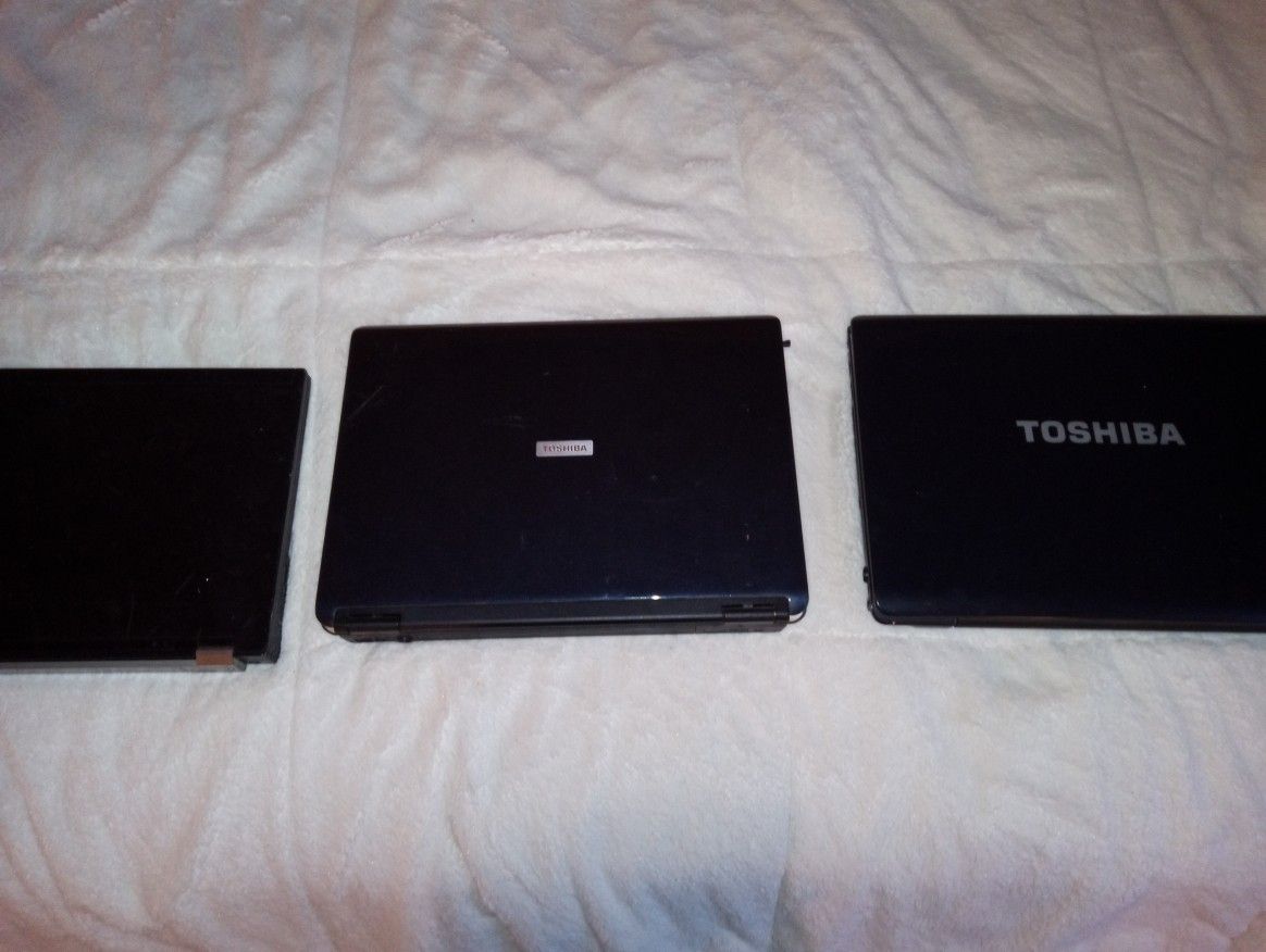 Three Laptops Two Toshiba's And One Dello Not Included They All Work Come On I Just Don't Have The Chords One Price We're AllCords