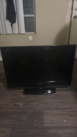 Black Sharp Aquos TV (25+ Inches)