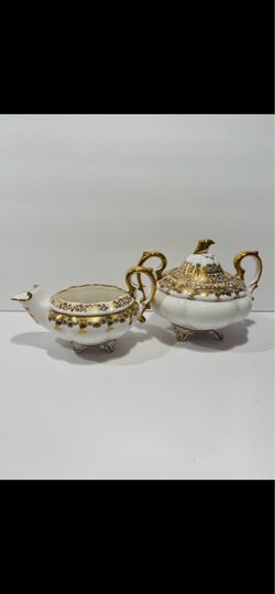 Vintage Royal Stafford Gold Regent Filigree Creamer & Sugar Bowl Very Rare. Beautiful tea set is in very good condition. Very unique set . Size is: Su