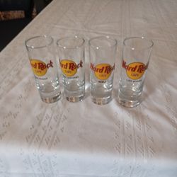 4 Collectible Hard Rock Hotel Shot Glasses.