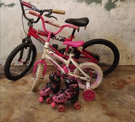 Boy bike . Girl bike. Girl roller skates.