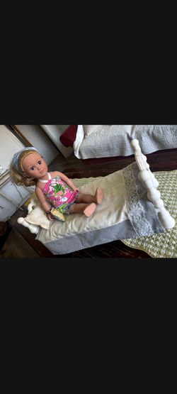 Doll with bed