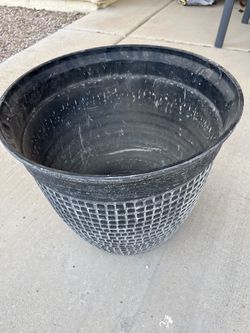 Decorative resin planter 13.5”H  16”Top Diameter