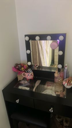 Black vanity with chair