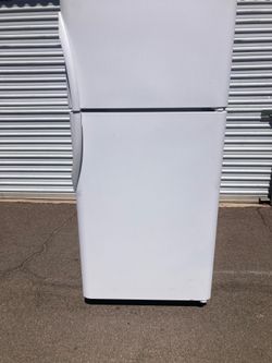 Frigidaire top-bottom refrigerator in good, clean, and nice condition. One month warranty. Delivery available. Dimensions: W30-D30-H66