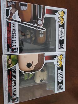 Cool Funko Pop figures. Has two Princess Leia bobble-heads from Star Wars. One is number 606 and the other is number 607. Both are in original boxes.